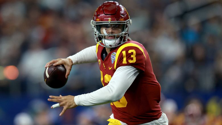 ARLINGTON, TEXAS - JANUARY 02: Caleb Williams #13 of the USC Trojans throws a touchdown pass against the Tulane Green Wave in the second quarter of the Goodyear Cotton Bowl Classic on January 02, 2023 at AT&T Stadium in Arlington, Texas. (Photo by Tom Pennington/Getty Images)