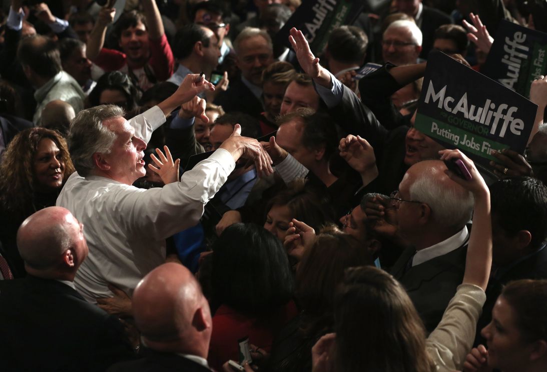Terry McAuliffe greets supporters during an election-night party in Tysons Corner, Virginia, after winning the Virginia governor's race on November 5, 2013.