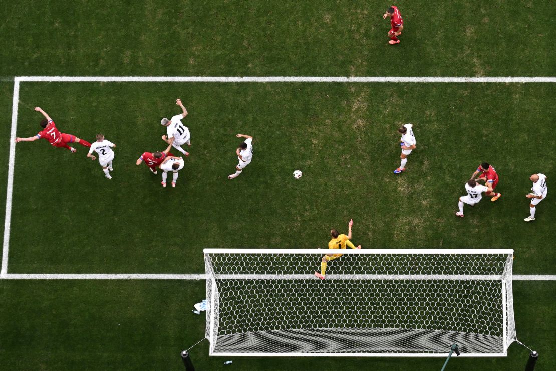Serbia kept its hopes alive of reaching the knockout stages with a draw on Thursday.