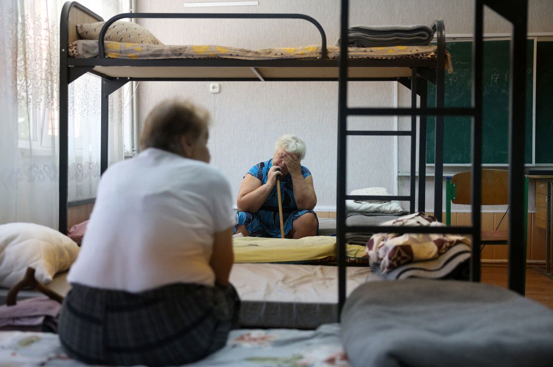 Residents wait before being evacuated to a shelter in the Pokrovsk Donetsk region of Ukraine on July 29. 