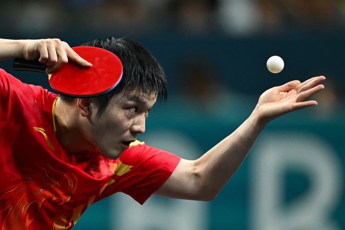 Chinese table tennis player Fan Zhendong serves to Sweden’s Truls M?reg?rdh during the final of men's singles on August 4. <a >Fan won 4-1</a>.