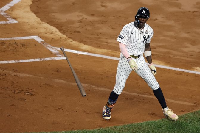 Chisholm Jr. tosses his bat after hitting his first-inning home run.