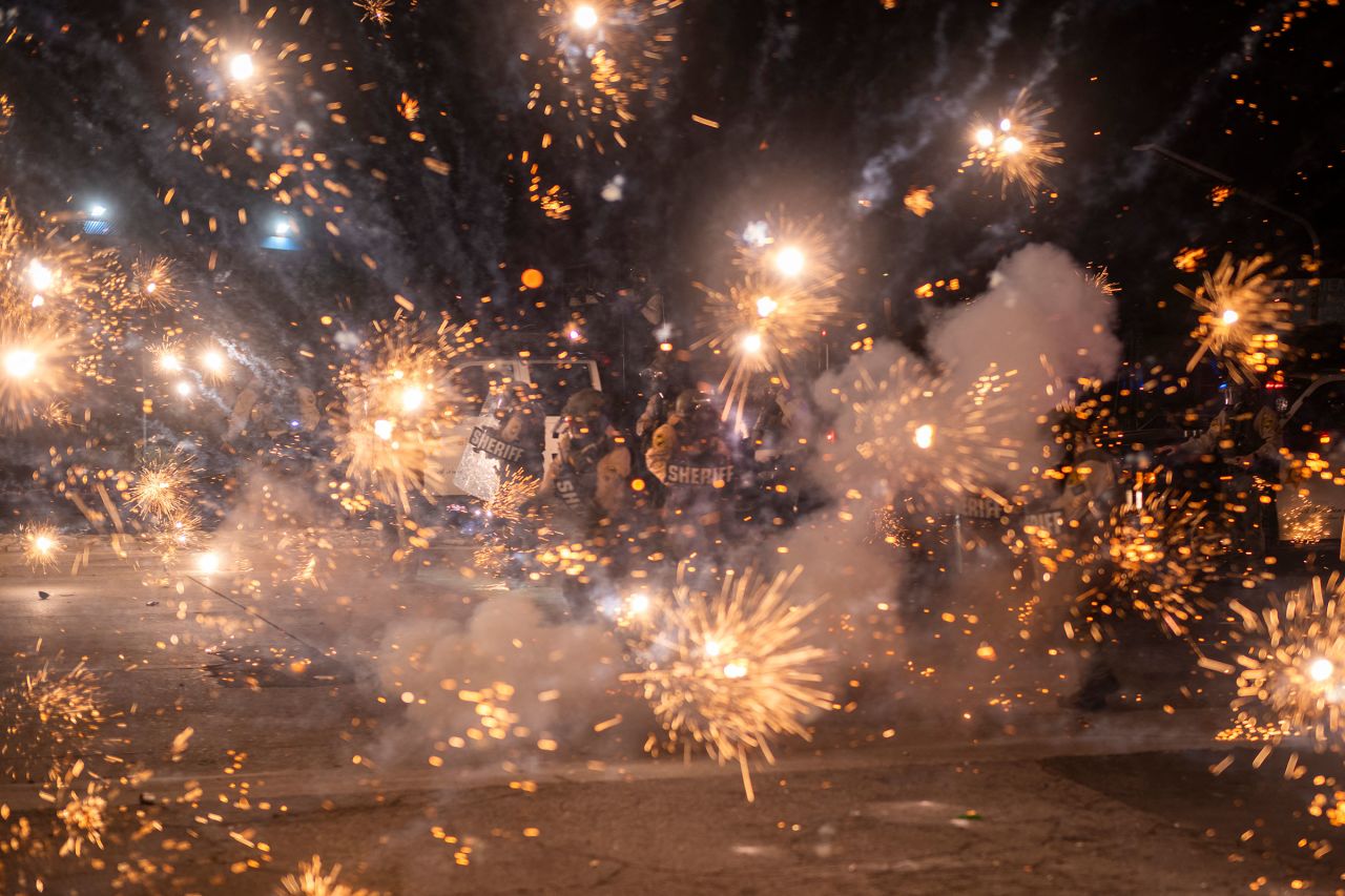 Members of the Los Angeles County Sheriffs department are seen as law enforcement clashes with demonstrators during a protest in the Compton neighborhood of Los Angeles, following federal immigration operations, on Saturday.