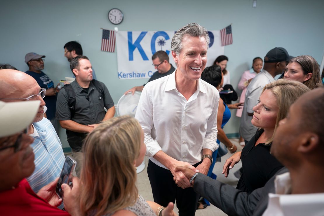 California Gov. Gavin Newsom shakes hands with people in Camden, South Carolina, on July 8, 2025, during a two-day tour of rural South Carolina.