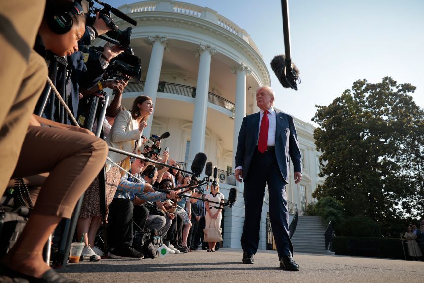 President Donald Trump talks to reporters as he departs the White House on July 25, 2025, in Washington, DC.