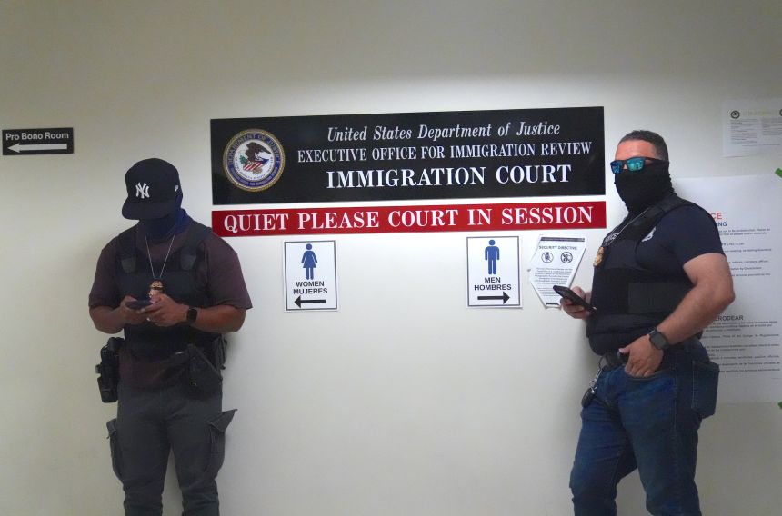 Masked ICE agents seen in the corridors on the 12th floor of Lower Manhattan's immigration court in New York, on September 8.