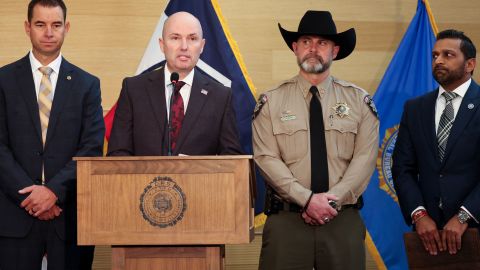 (L-R) Utah Department of Public Safety Beau Mason, Utah Governor Spencer Cox, Sheriff Mike Smith and FBI director Kash Patel attend a press conference outside the Doterra Auditorium at Utah Valley University a day after youth activist and influencer Charlie Kirk was shot during a public event in Orem, Utah, on September 12, 2025. The gunman who shot dead US right-wing youth leader Charlie Kirk in a targeted killing remained at large Thursday but authorities said they have video images of the suspect and have recovered a "high-powered" rifle. Kirk, a 31-year-old superstar on the Republican right who was credited with helping Donald Trump return to the presidency last year, was shot while addressing a large crowd at Utah Valley University on Wednesday. (Photo by Patrick T. Fallon / AFP) (Photo by PATRICK T. FALLON/AFP via Getty Images)          