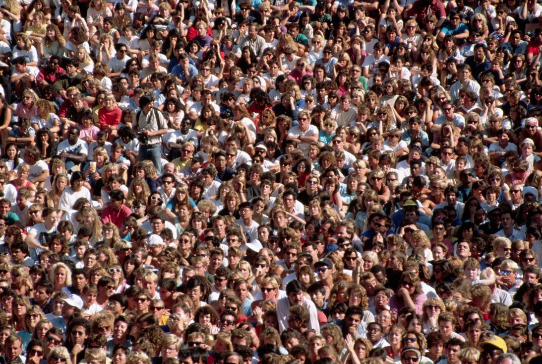 Crowds of people attend a rally for Jesse Jackson at the University of California in 1988.