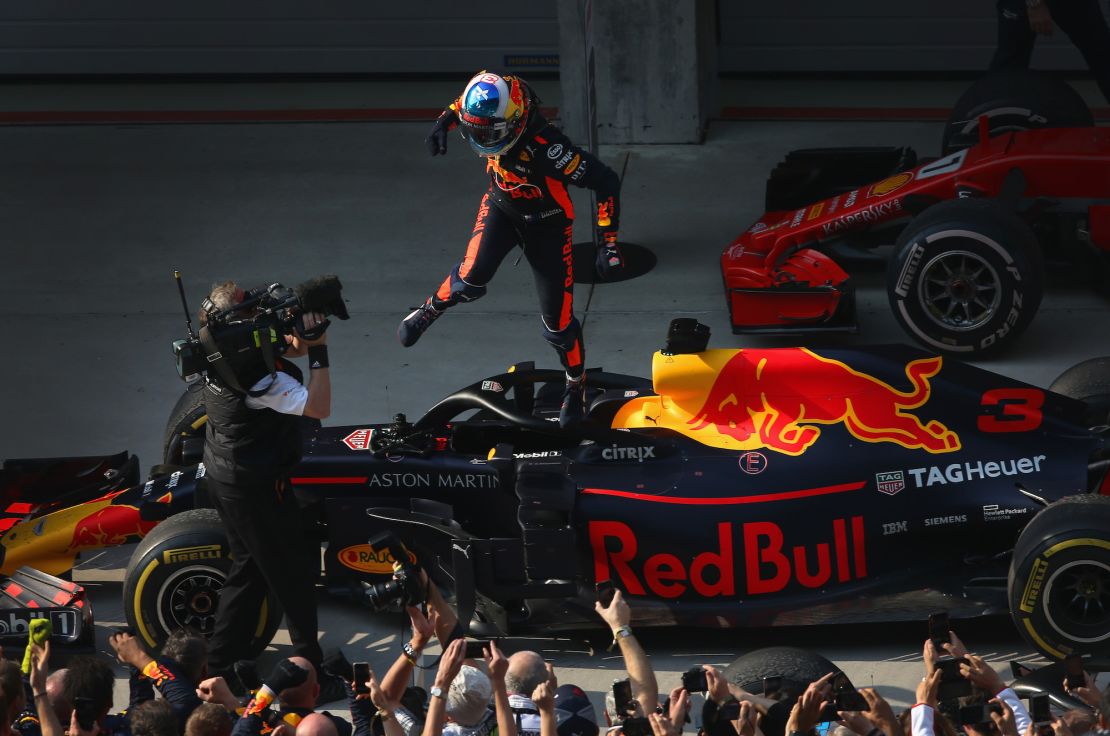 Ricciardo celebrates victory at the 2018 Chinese Grand Prix with Red Bull.