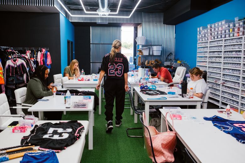 Siwa surveys the scene in Studio Siwa's rhinestone wing.