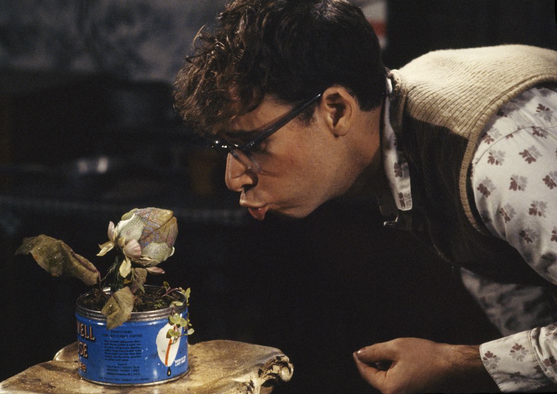 Rick Moranis with the plant Audrey II in "Little Shop of Horrors," directed by Frank Oz and released in 1986.