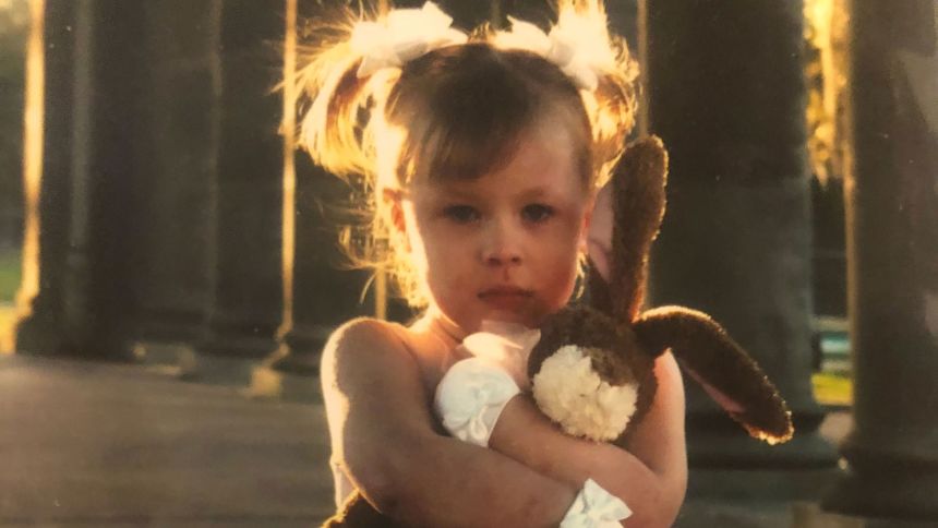 Mimi Hymel holds her stuffed animal "Cuddles" who was later lost in the floodwaters during Hurricane Katrina.