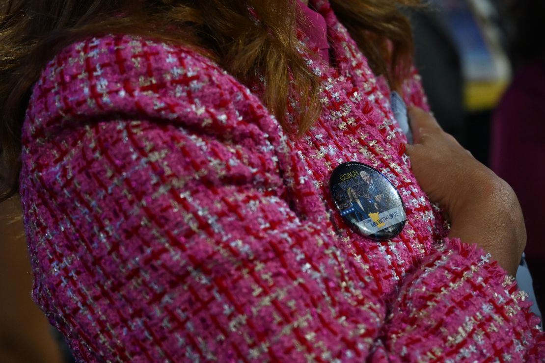 A person wears a pin featuring Democratic presidential ticket Kamala Harris and Tim Walz at the 2024 Democratic National Convention in Chicago on August 21, 2024.