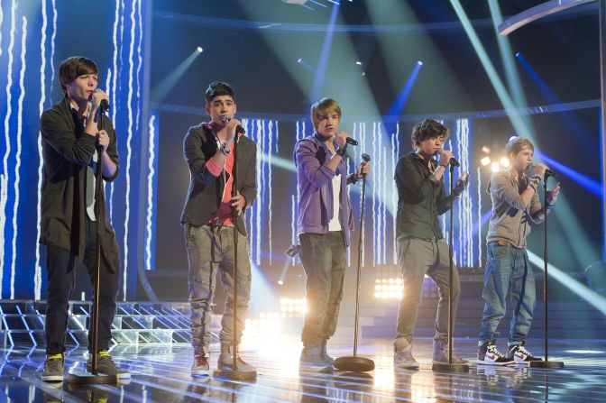 From left: Louis Tomlinson, Zayn Malik, Payne, Harry Styles and Niall Horan perform as One Direction on "The X Factor" in 2010. The group, which was formed by judge Nicole Scherzinger, came third in the competition.