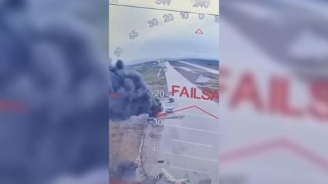 A still from a video obtained by CNN appears to show Russian combat planes burning on the tarmac following a large scale Ukrainian drone attack Sunday, June 1, 2025. CNN cannot independently verify the location of the videos but a source in the Ukrainian Security Service (SBU) said Sunday’s drone strikes targeted four airbases deep inside Russia.