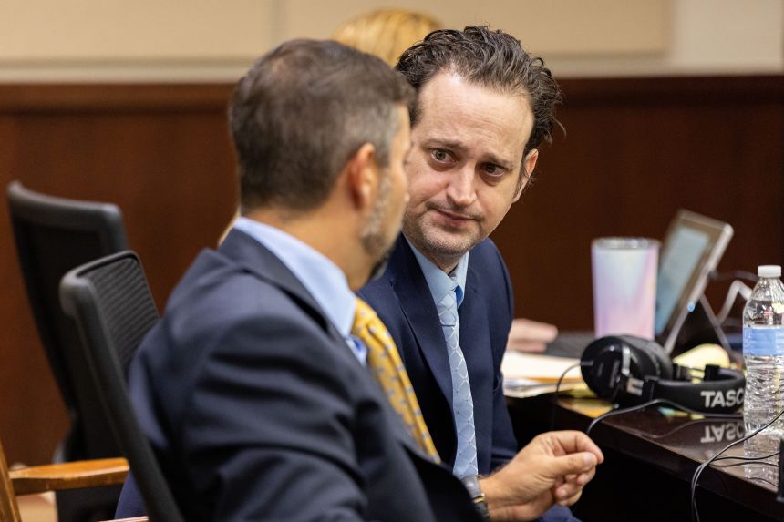 Charles Adelson talks with his defense attorney Daniel Rashbaum at his trial on November 2, 2023.