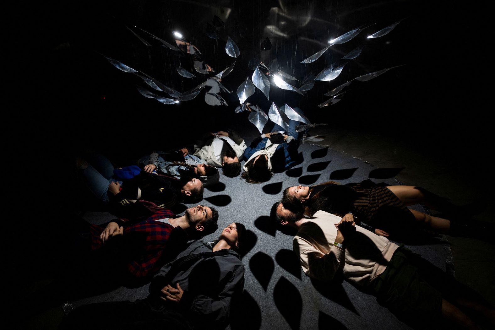 Festivalgoers attend the INOTA music and visual arts festival at an abandoned thermal power plant in Várpalota, Hungary, on Thursday, August 31.