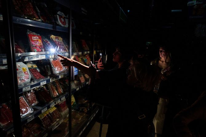 People buy food at a supermarket in Pamplona, Spain, during a massive power outage on Monday, April 28, that also affected Portugal. <a  target="_top" href="/newspapers?url=https://www.cnn.com/2025/04/29/europe/what-caused-spain-portugal-blackout-explainer-intl/index.html">The sudden and staggering blackout</a> plunged tens of millions of people into darkness and paralyzed life on the Iberian peninsula.