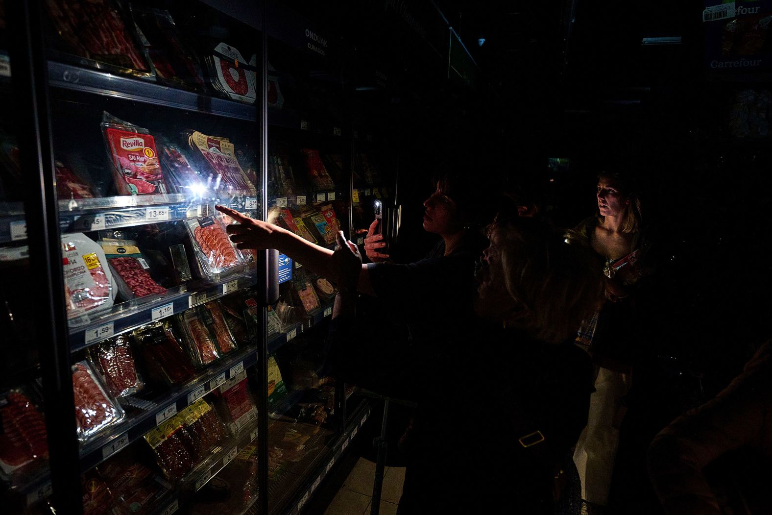 People buy food at a supermarket in Pamplona, Spain, during a massive power outage on Monday, April 28, that also affected Portugal. <a href="https://www.cnn.com/2025/04/29/europe/what-caused-spain-portugal-blackout-explainer-intl/index.html">The sudden and staggering blackout</a> plunged tens of millions of people into darkness and paralyzed life on the Iberian peninsula.