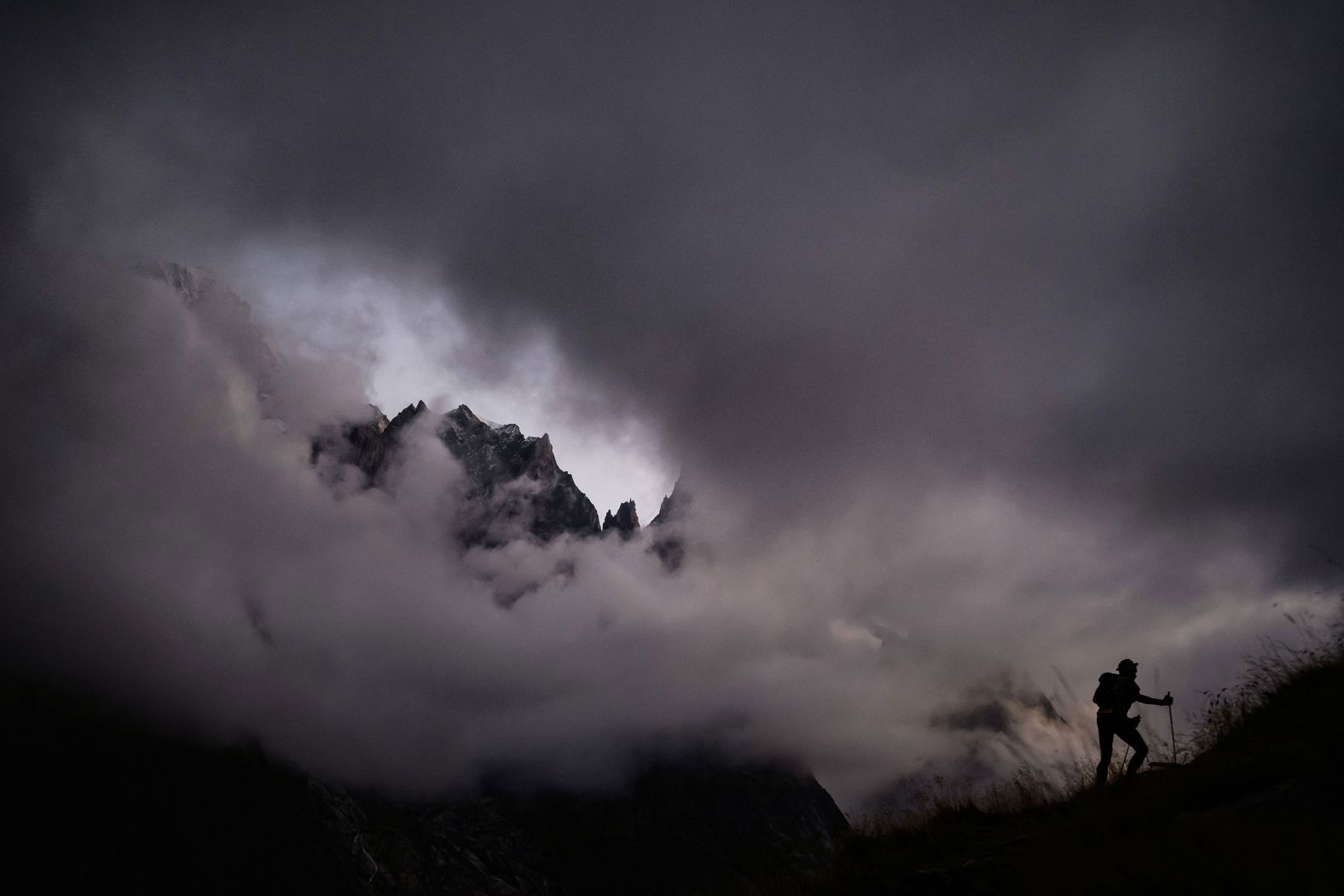 An athlete is seen in Chamonix, France, while competing in the Ultra Trail du Mont-Blanc, a mountain ultramarathon, on Saturday, September 2.