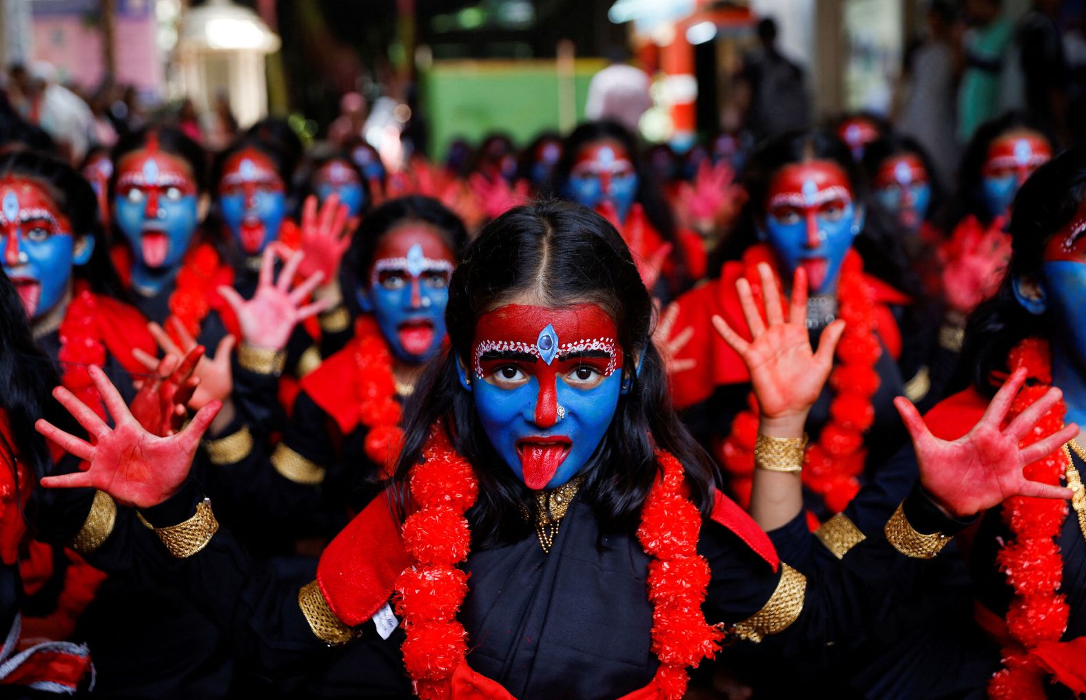 Children, with their faces painted as the Hindu goddess Kali, take part in a cultural event ahead of the Janmashtami festival in Mumbai, India, on Monday, September 4.