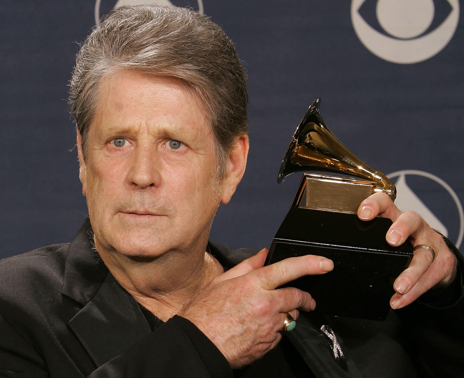 Wilson poses with a Grammy Award he won for best rock instrumental performance ("Mrs. O'Leary's Cow") in 2005.