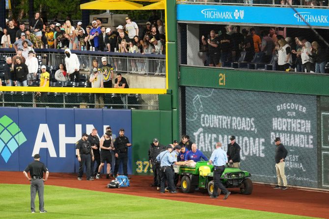 A fan receives medical attention at PNC Park in Pittsburgh after <a  target="_top" href="/newspapers?url=https://www.cnn.com/2025/04/30/sport/fan-hospitalized-after-fall-outfield-wall-pnc-park-spt">falling from the right-field wall and onto the field</a> during a Major League Baseball game on Wednesday, April 30.