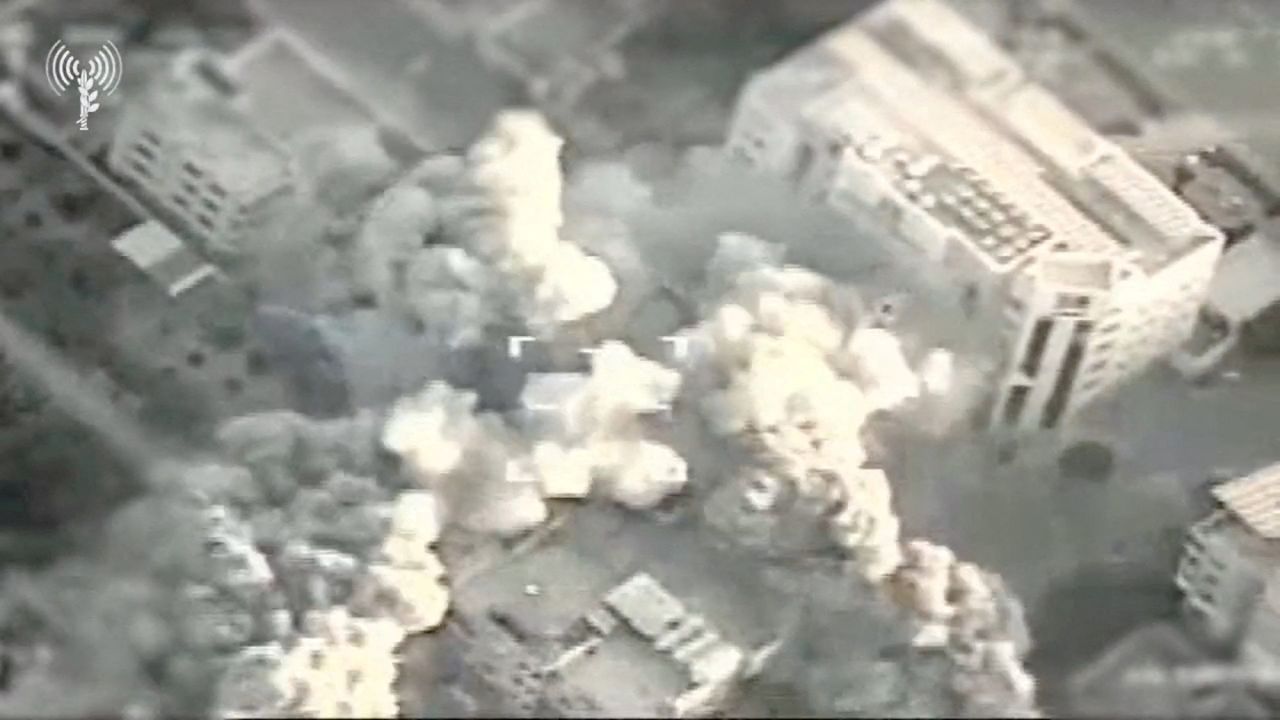 A view of an explosion following a strike by IDF fighter jets on Hamas targets at a location given as the Gaza Strip, in this screengrab taken from a handout video released on October 13.