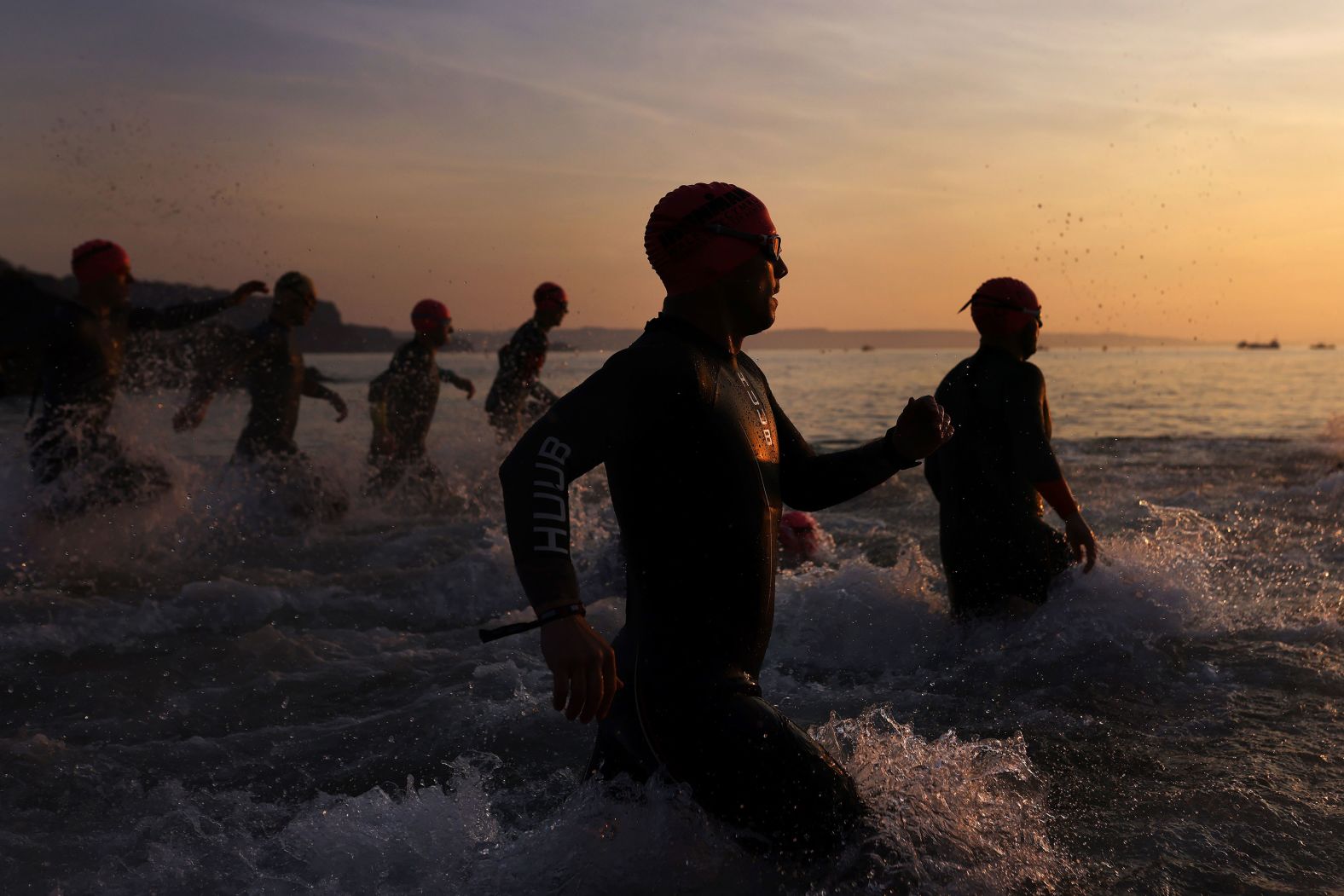 Triathletes take part in the swimming portion of the Ironman race in Pembroke, Wales, on Sunday, September 3.