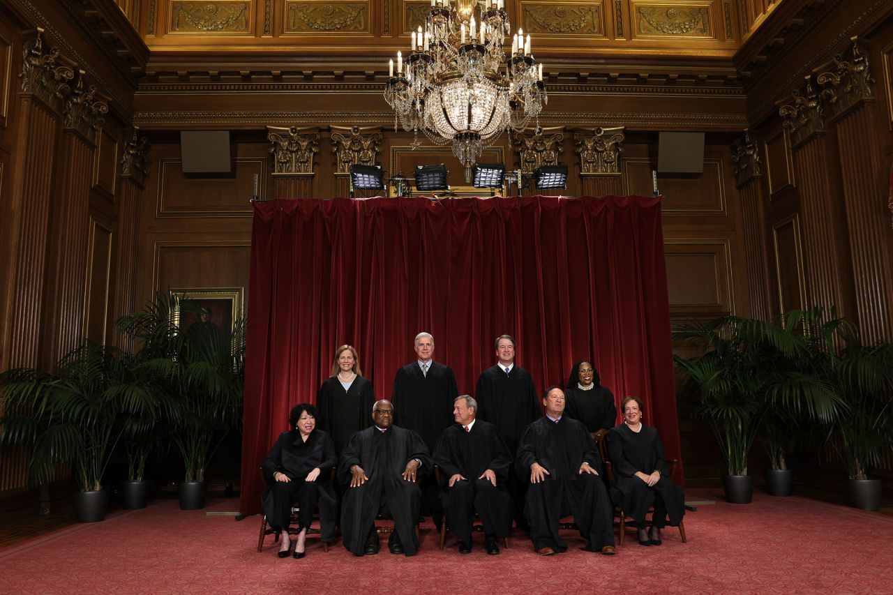 United States Supreme Court (front row L-R) Associate Justice Sonia Sotomayor, Associate Justice Clarence Thomas, Chief Justice of the United States John Roberts, Associate Justice Samuel Alito, and Associate Justice Elena Kagan, (back row L-R) Associate Justice Amy Coney Barrett, Associate Justice Neil Gorsuch, Associate Justice Brett Kavanaugh and Associate Justice Ketanji Brown Jackson pose for their official portrait at the East Conference Room of the Supreme Court building on October 7, 2022 in Washington, DC.