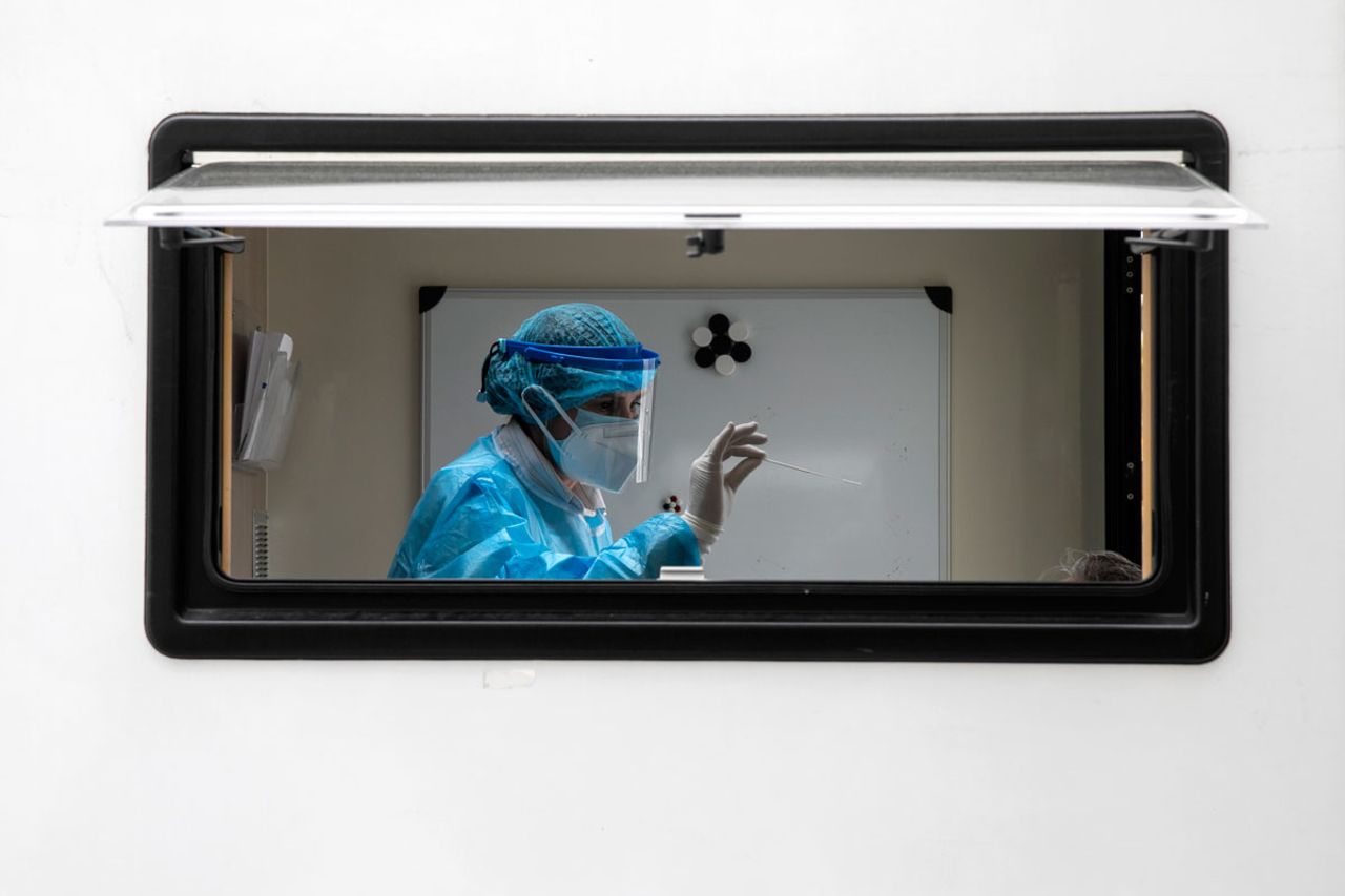 A member of the medical staff from the National Health Organisation (EODY) conducts a rapid test for Covid-19 at a mobile testing point in Athens, Greece on March 14.