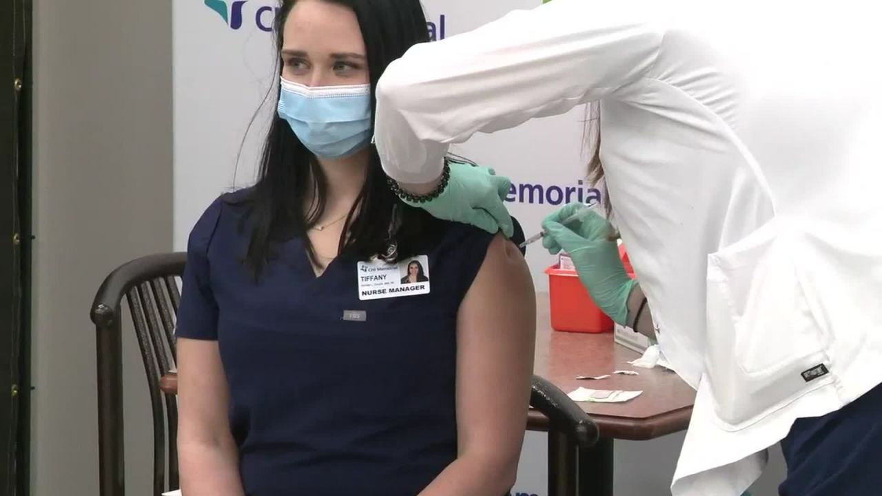 Nurse Manager Tiffany Dover receives the vaccine on Thursday.