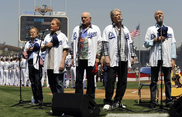 The Beach Boys perform the national anthem before a Los Angeles Dodgers baseball game in 2012. That year, Wilson reunited with the band to release “That’s Why God Made the Radio,” for the band’s 50th anniversary tour.