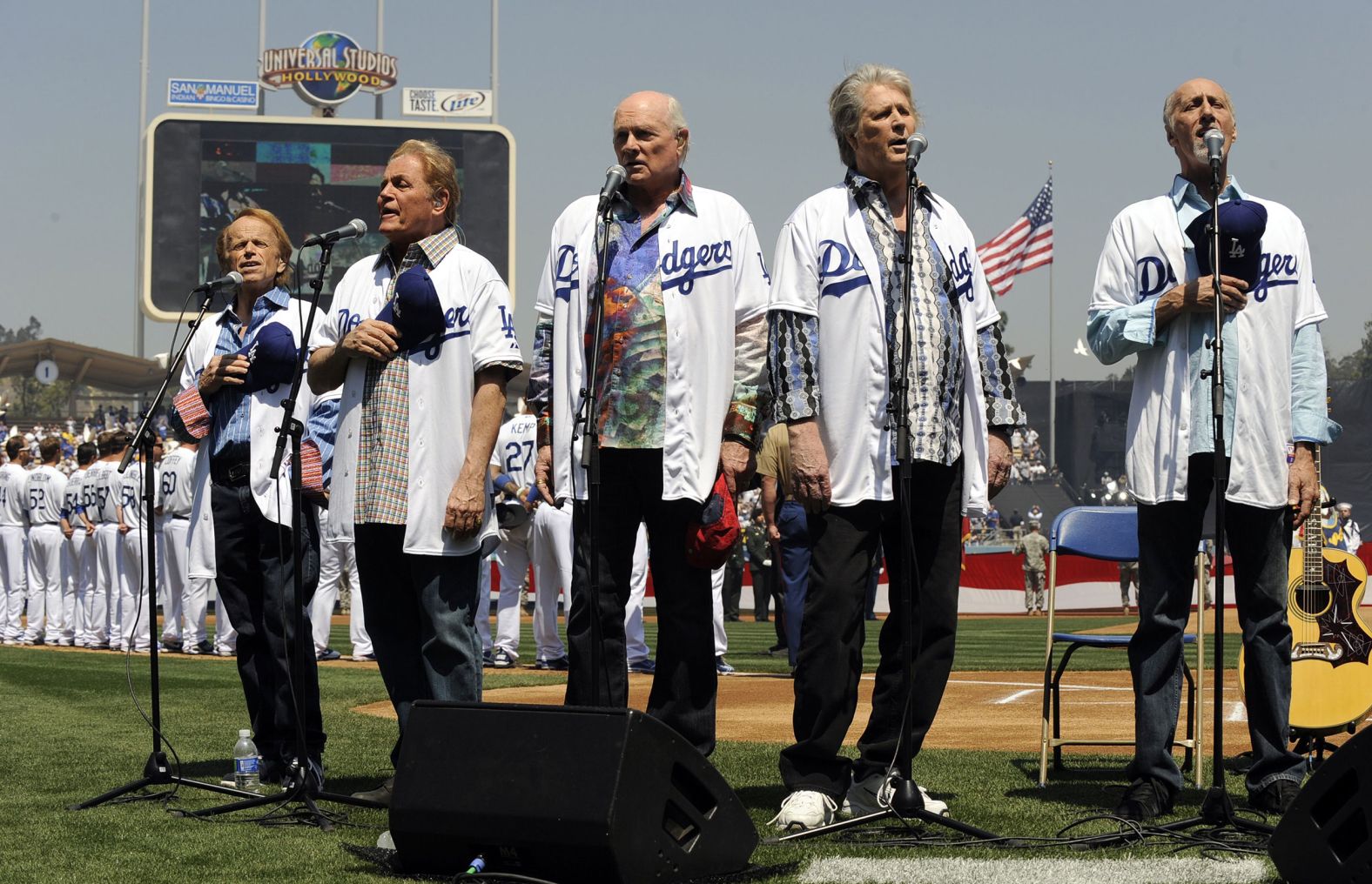 The Beach Boys perform the national anthem before a Los Angeles Dodgers baseball game in 2012. That year, Wilson reunited with the band to release “That’s Why God Made the Radio,” for the band’s 50th anniversary tour.