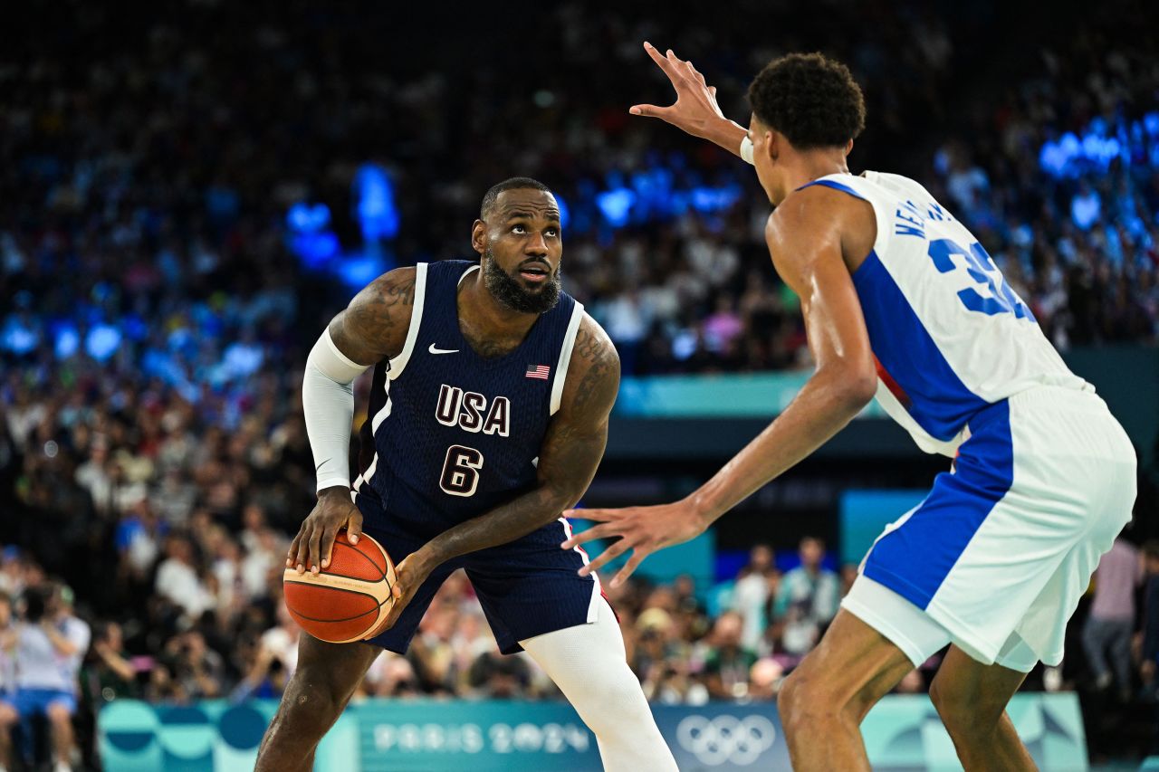 LeBron James challenges France's Victor Wembanyama on Saturday. 