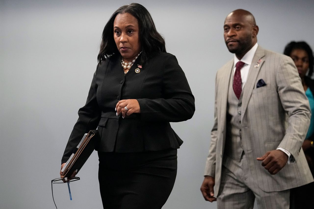 Fulton County District Attorney Fani Willis arrives at a press conference in the Fulton County Government Center in Atlanta on August 14.