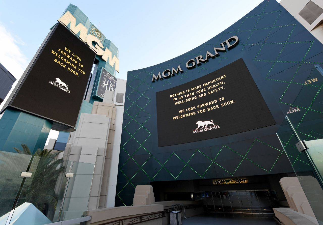 The marquee and sign at an entrance of the MGM Grand & Hotel & Casino display messages after the Las Vegas Strip resort was closed as a precaution against coronavirus on March 17 in Las Vegas.?