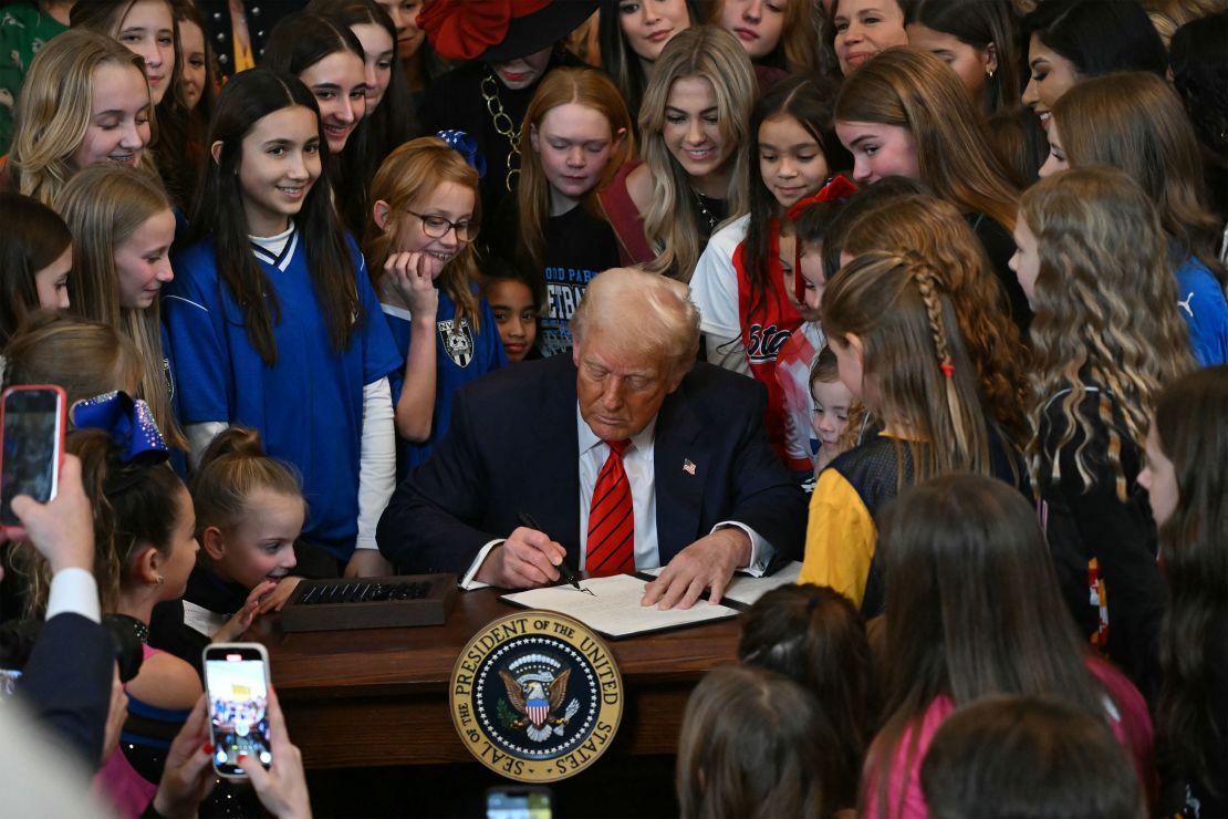 President Donald Trump signs an executive order to ban transgender women from competing in women's sports at the White House in Washington, DC, on February 5.