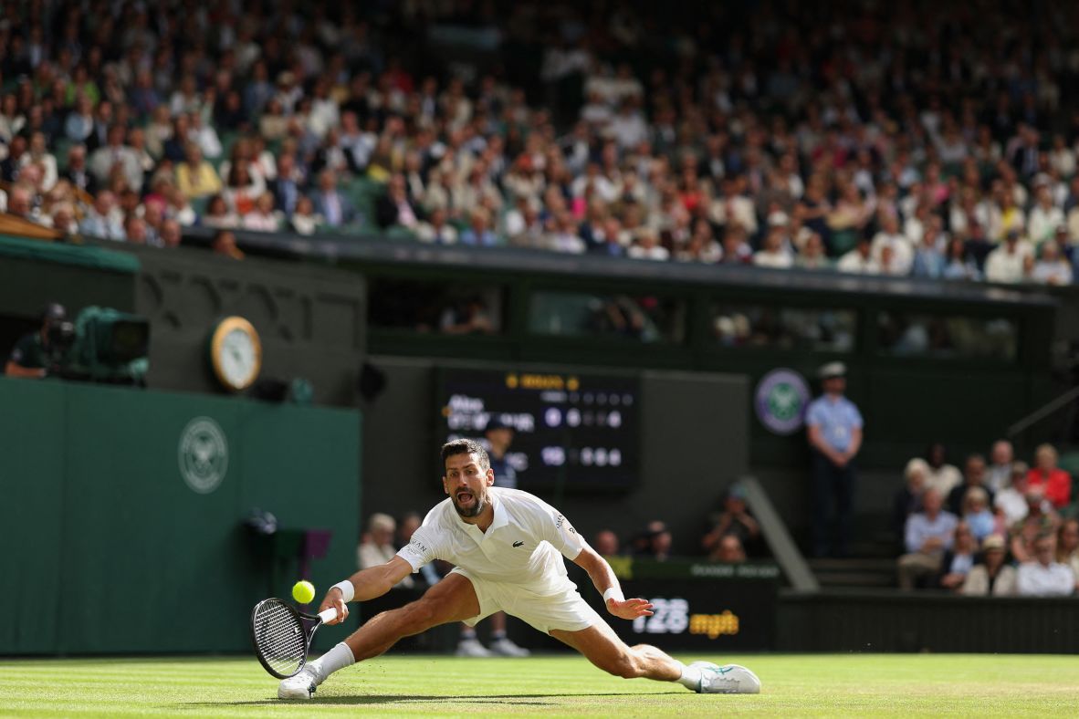 Novak Djokovic stretches for a shot during his Wimbledon match against Alex de Minaur on Monday, July 7. Djokovic won to advance to the quarterfinals.