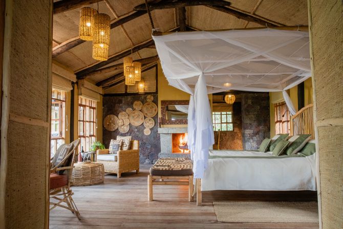 <strong>Mount Gahinga lodge deluxe room:</strong> Stays at Volcanoes Safaris' lodges in Uganda can cost from $1,200 per person per night.