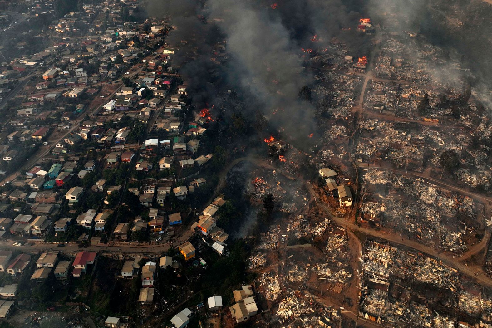 A wildfire burns in Viña del Mar, Chile, on Saturday, February 3. <a href="index.php?page=&url=https%3A%2F%2Fwww.cnn.com%2F2024%2F02%2F06%2Fclimate%2Fchile-wildfires-deadliest-climate-intl%2Findex.html">The devastating wildfires tearing across large parts of Chile</a> are believed to be the country’s deadliest on record, according to the United Nations disaster agency.