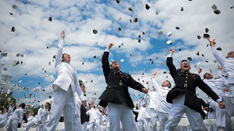 ANNAPOLIS, MARYLAND - MAY 23: U.S. Naval Academy graduates throw their caps during the 2025 Naval Academy Graduation and Commissioning Ceremony on May 23, 2025 in Annapolis, Maryland. 1,049 men and women graduated in the class of 2025 and will enter the Navy or Marine Corps, where they will serve for at least five years. (Photo by Kayla Bartkowski/Getty Images)