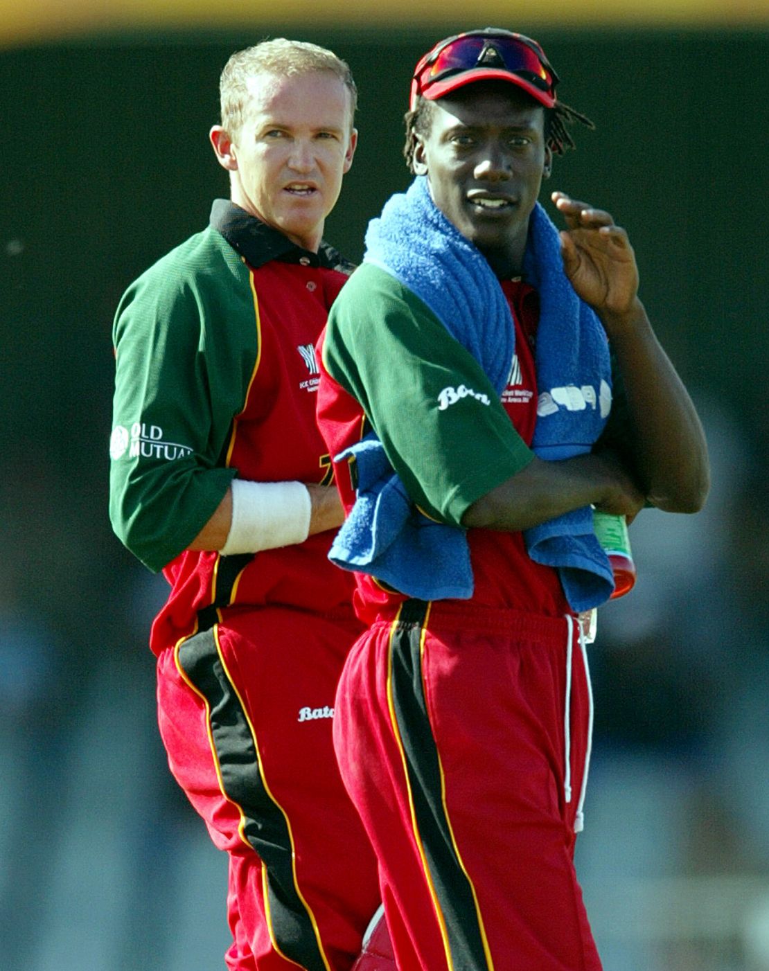 Flower (left) and Olonga were both exiled from Zimbabwe following their Cricket World Cup protest.