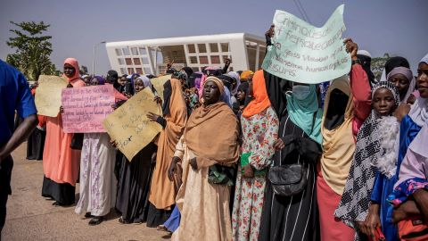 Supporters of the bill aimed at decriminalizing female genital mutilation demonstrate as parliament debates the legislation in March 2024.