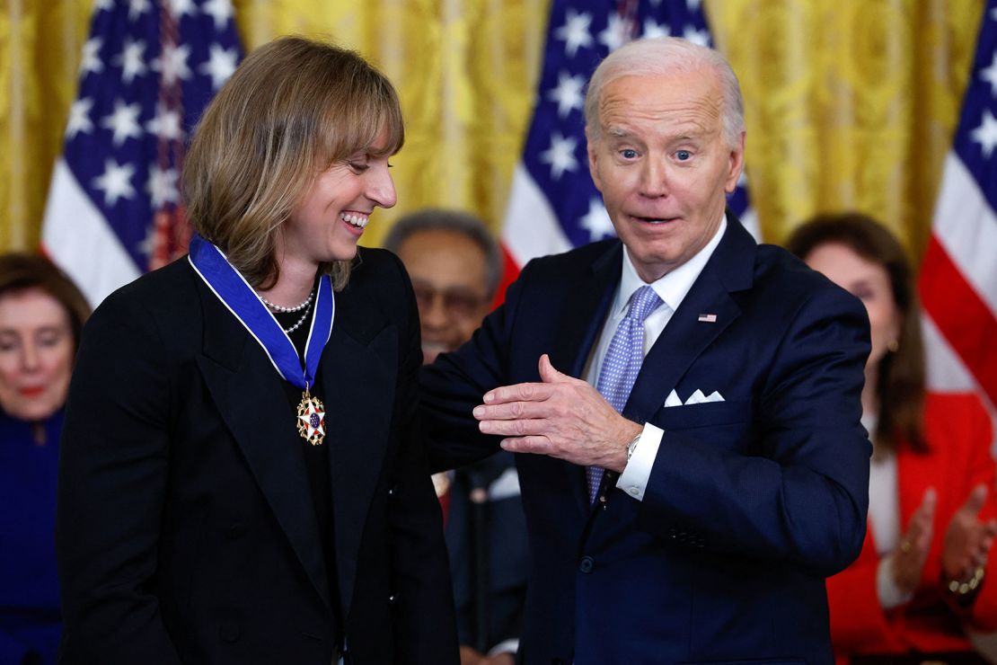 President Joe Biden presents the Presidential Medal of Freedom to Olympic swimmer Katie Ledecky during a ceremony at the White House in Washington, DC, on May 3, 2024.