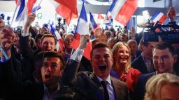 Supporters of the French far-right National Rally (Rassemblement National - RN) party react after the polls closed during the European Parliament elections, in Paris, France, June 9, 2024. REUTERS/Sarah Meyssonnier