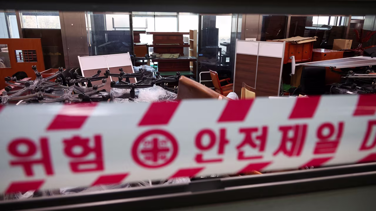 Furniture lies piled up in a room after military forces broke into the National Assembly.