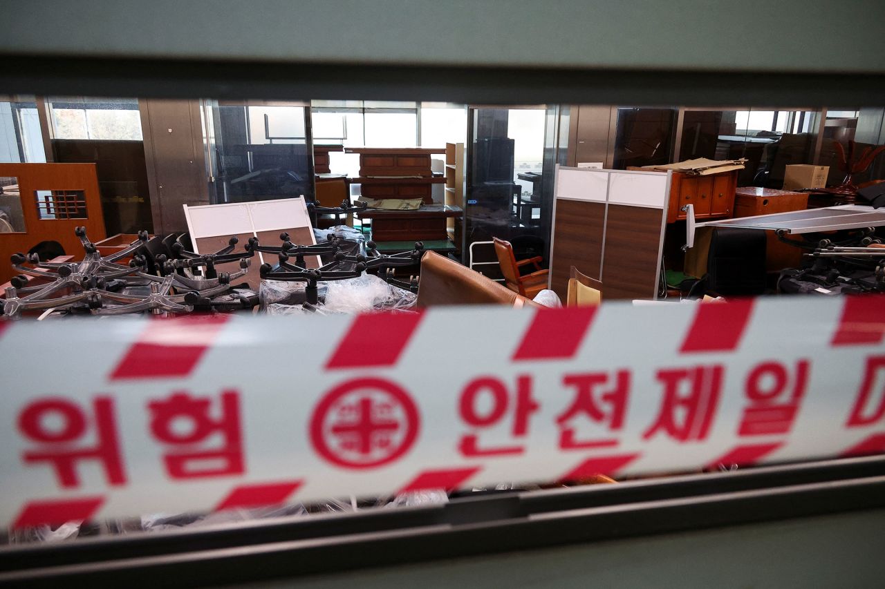 Furniture lies piled up in a room after military forces broke into the National Assembly.