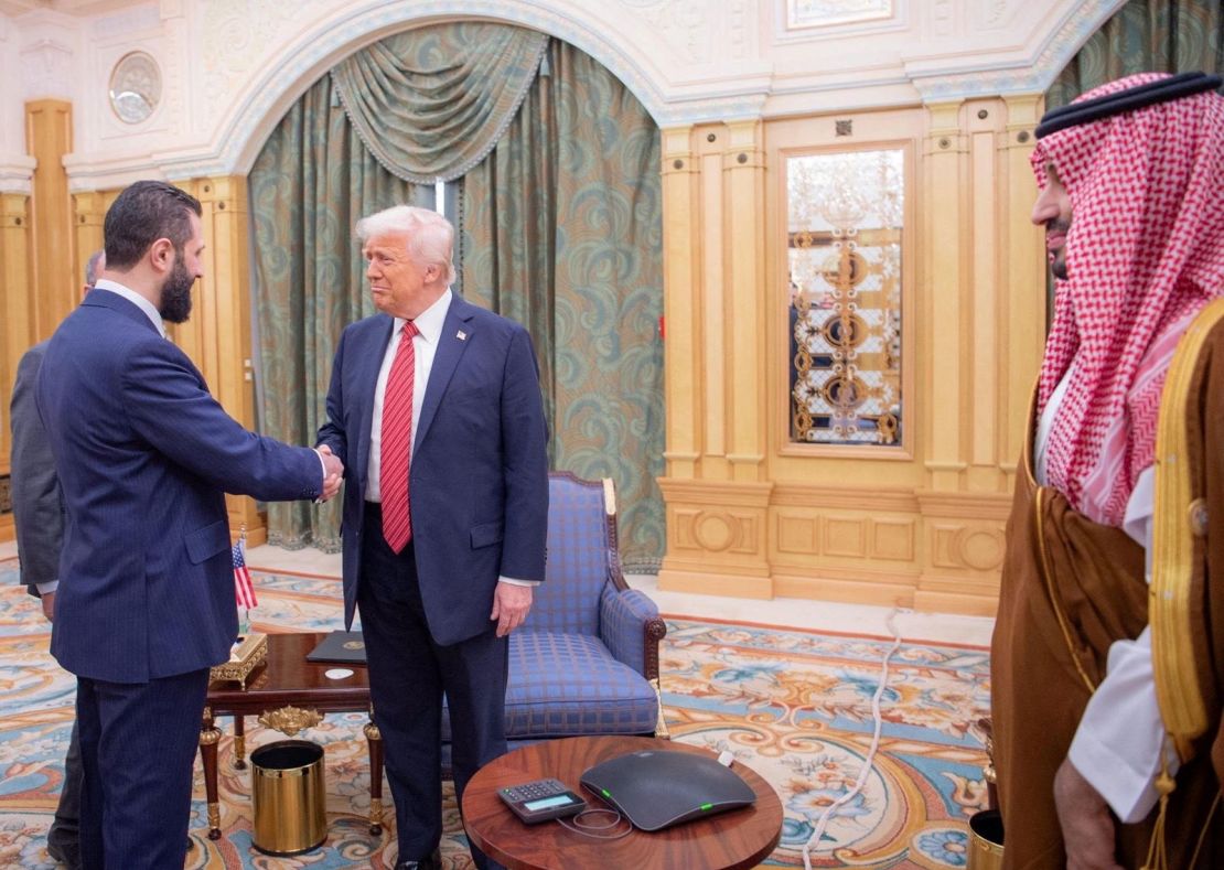 President Donald Trump meets with the Syrian leader Ahmed al-Sharaa in Riad, Saudi Arabia, in this handout published on May 14, 2025.