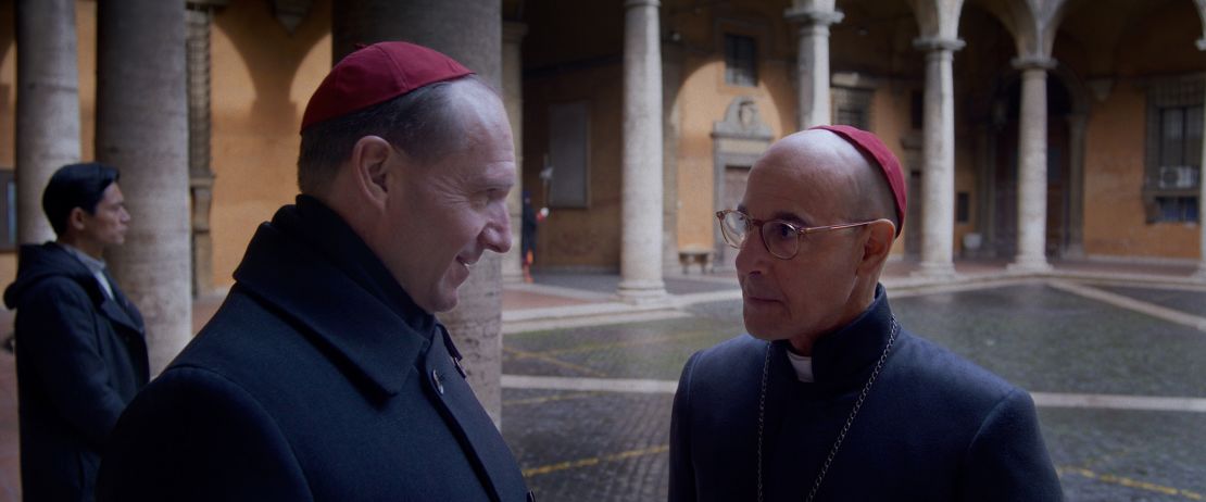 Ralph Fiennes, left, and Stanley Tucci appear in "Conclave."